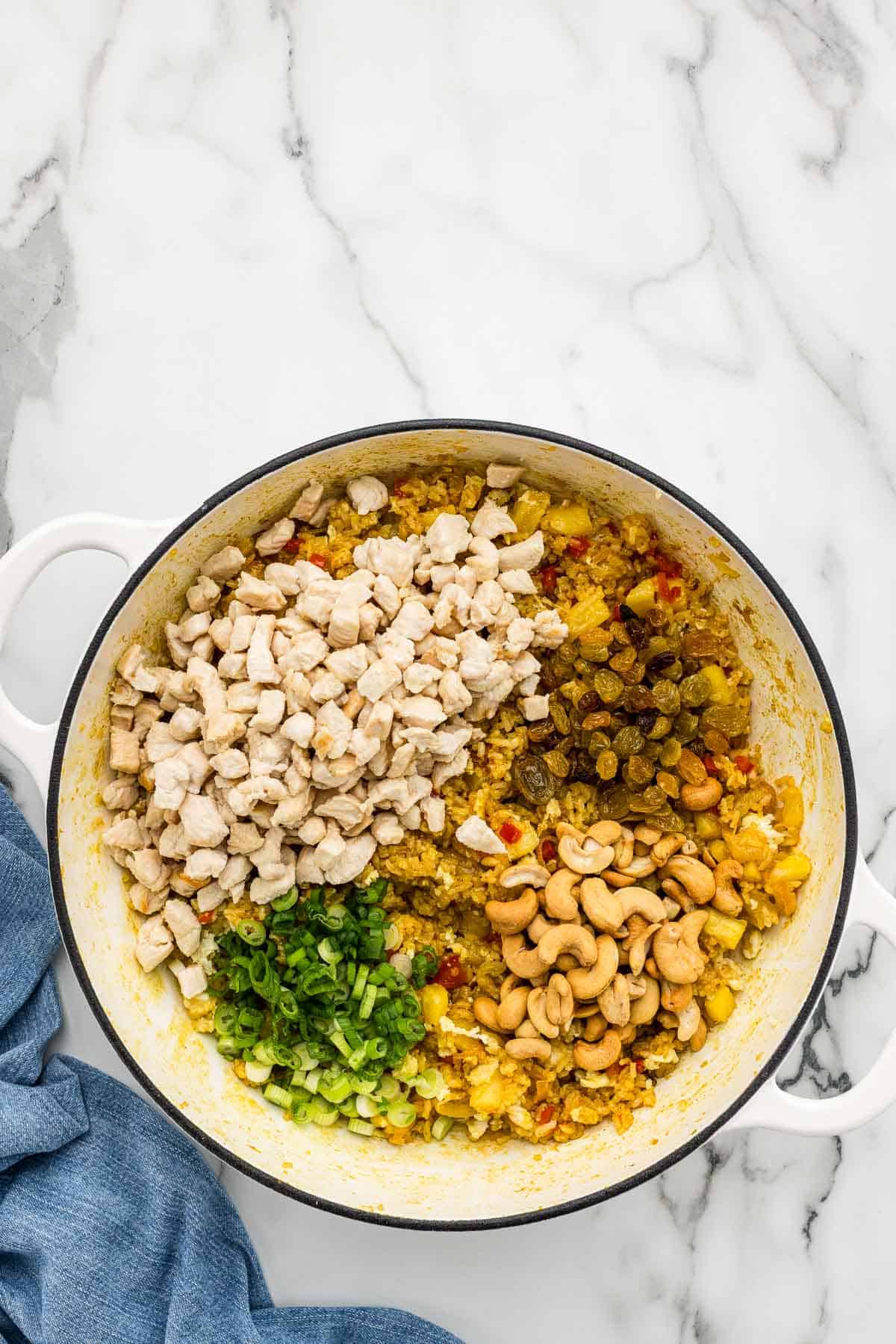 Ingredients added to a skillet unmixed.