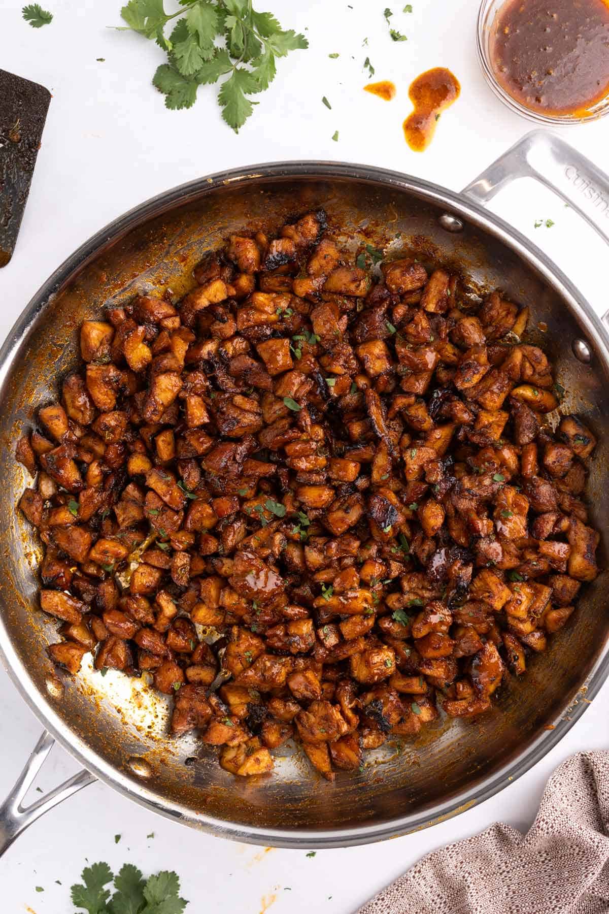 A skillet of honey chipotle chicken.