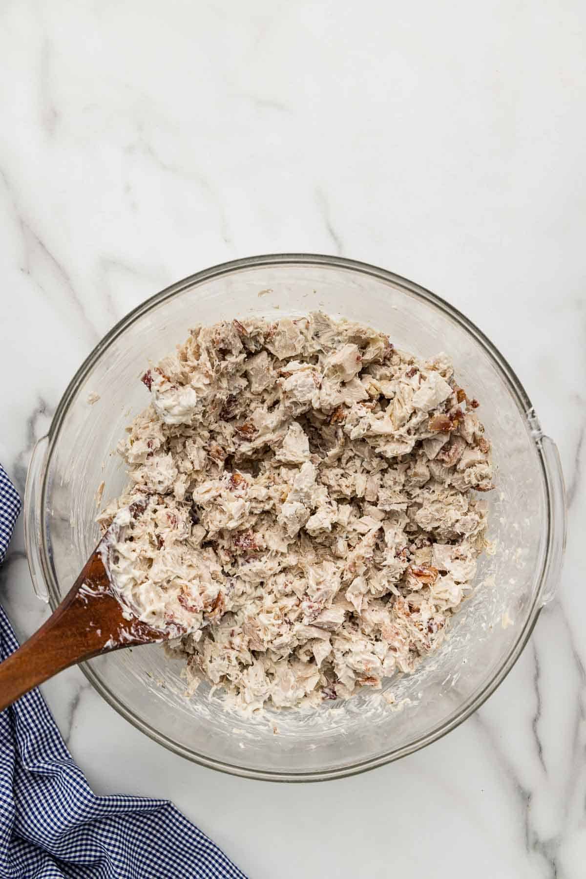 Chicken, bacon and ranch mixture in a glass bowl.