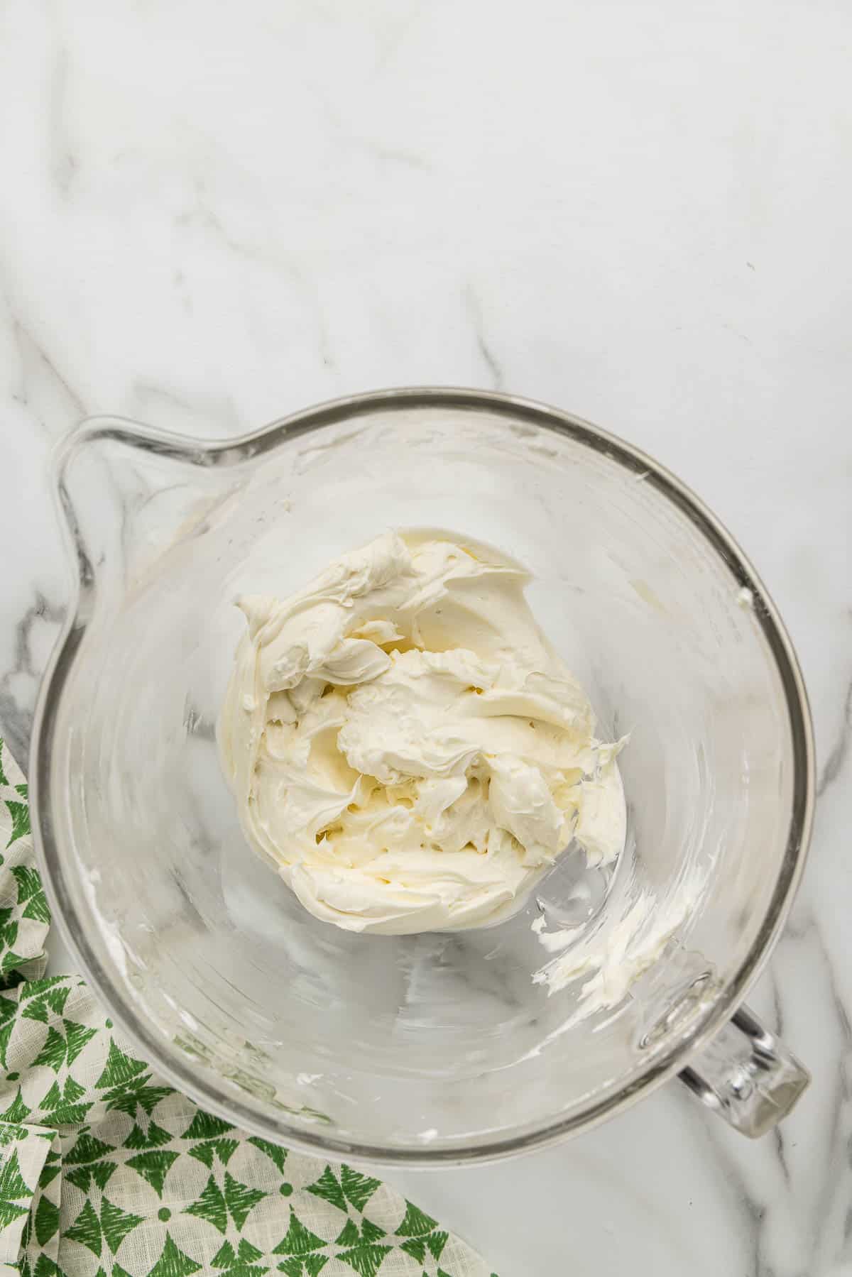 Cream cheese in a mixing dish.