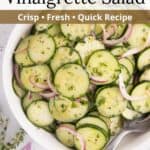 Cucumbers mixed with onions and dressing in a bowl with an overlay of text.