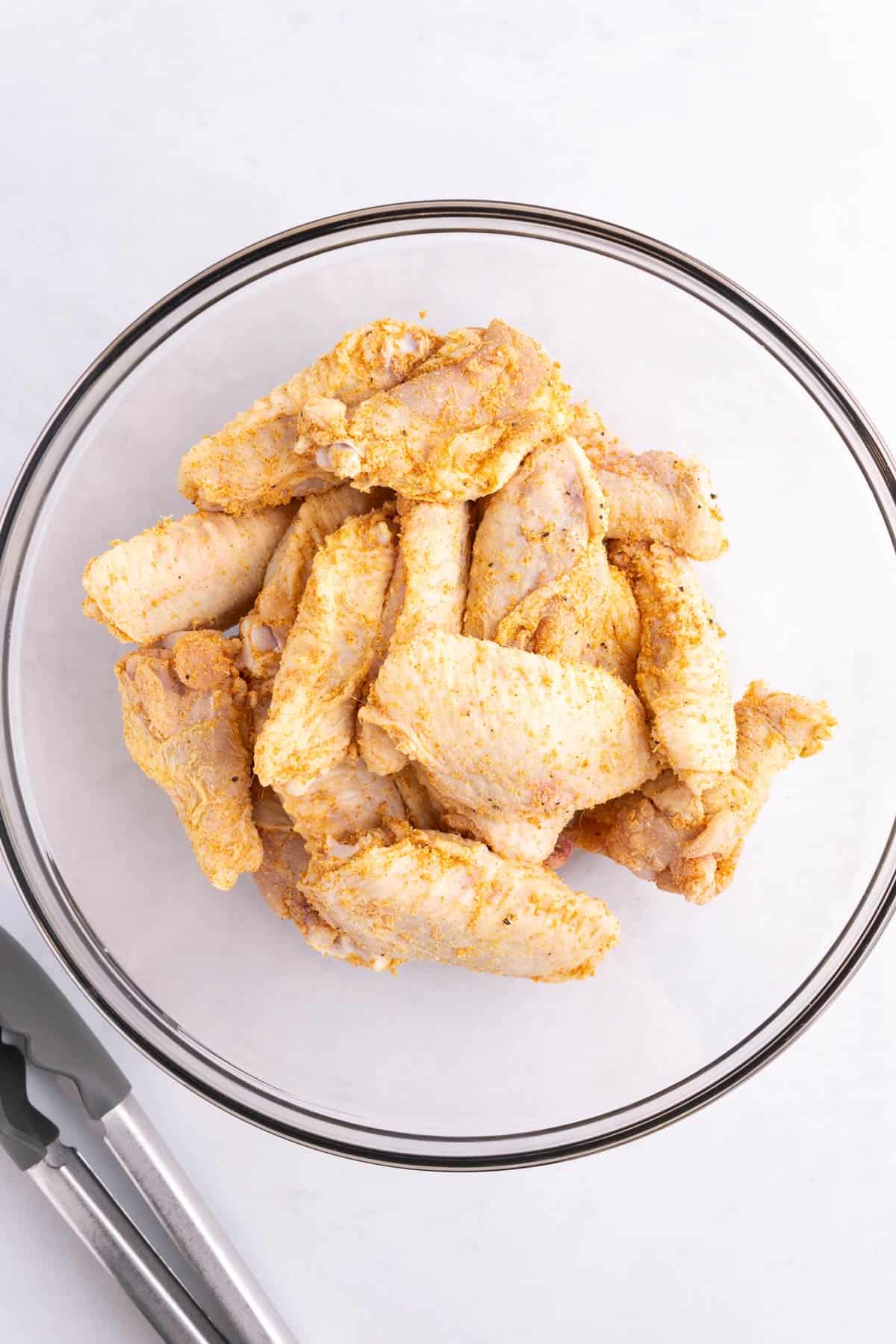 A bowl of seasoned wings.